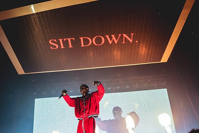 Kendrick Lamar on stage. Image via Wikimedia Commons.